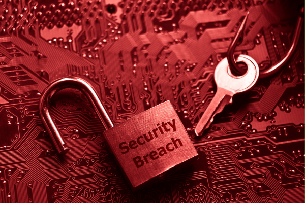 Visual representation of a data breach with a breached computer screen and open lock.